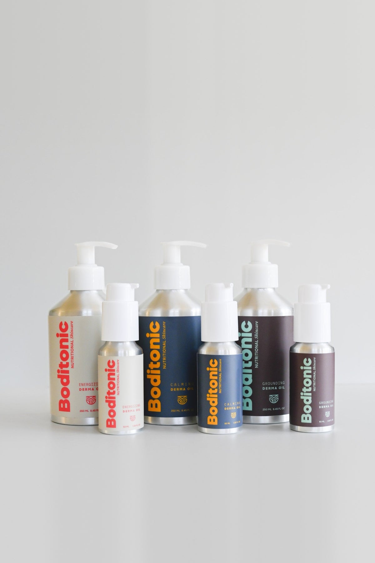 The Full Circuit: Boditonic Energizing, Calming and Grounding Derma Oils in 250 ml and 50 ml aluminum pump bottles